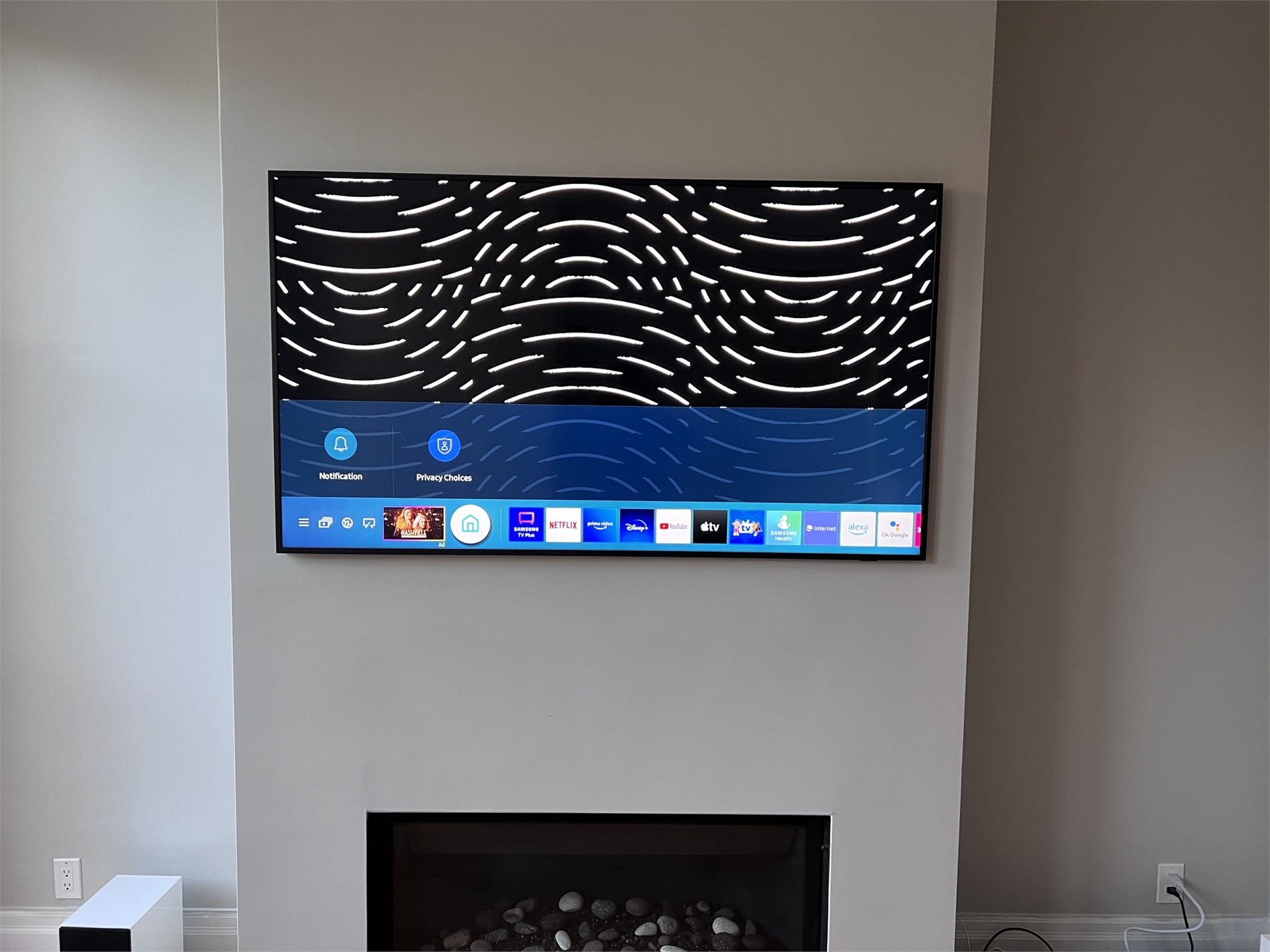 Wall mounted TV above fireplace